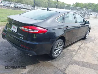 2019 Ford Fusion SEL with VIN 3FA6P0CD5KR182520, listed as a IAAI auction lot 42014190 with 107,028 mi miles and . Bid and sale history available at carsss.com. Image 4.