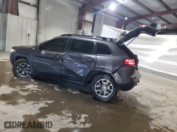 2022 Jeep Cherokee Trailhawk with VIN 1C4PJMBX8ND500503, listed as a Copart auction lot 85705204 with 31,112 mi miles and Salvage Title. Bid and sale history available at DreamBid. Image 2.