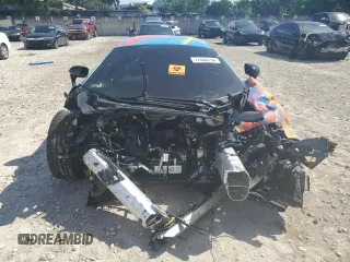 2019 McLaren 570S z VIN SBM13FAA9KW006456, wystawiony jako Copart lot #77400754 z przebiegiem Nie podano mil oraz Nie do naprawy. Historia ofert i sprzedaży dostępna na DreamBid. Obrazek 5.