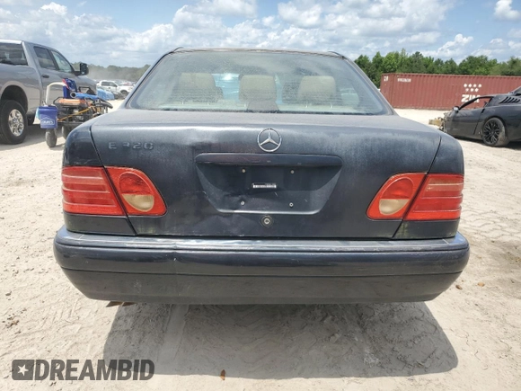 1996 Mercedes-Benz E 320 with VIN WDBJF55F5TJ003597, listed as a Copart auction lot 55982925 with Not Provided miles and Clean Title. Bid and sale history available at DreamBid. Image 6.