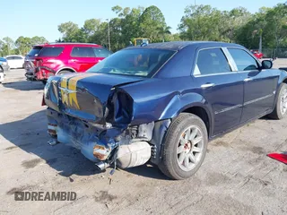 2005 Chrysler 300 300C AWD z VIN 2C3AK63H05H672425, wystawiony jako IAAI lot #42224241 z przebiegiem 143 185 mil mil oraz . Historia ofert i sprzedaży dostępna na DreamBid. Obrazek 12.