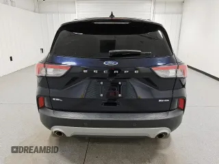 2021 Ford Escape SEL z VIN 1FMCU9H6XMUA64636, wystawiony jako Copart lot #62016695 z przebiegiem 98 479 mil mil oraz Czysty tytuł • Clean title. Historia ofert i sprzedaży dostępna na DreamBid. Obrazek 6.