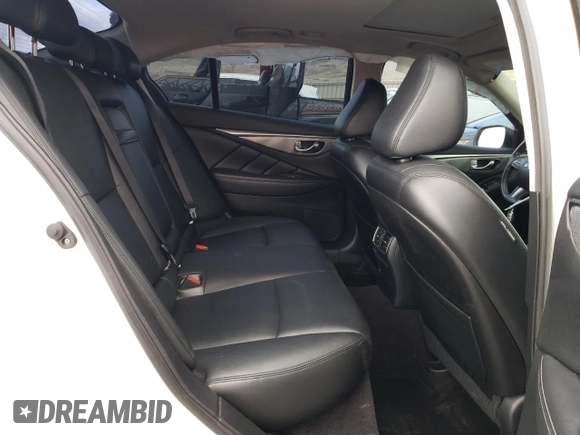 2015 Infiniti Q50 with VIN JN1BV7ARXFM423317, listed as a Copart auction lot 50971755 with 94,930 mi miles and Salvage Title. Bid and sale history available at carsss.com. Image 10.
