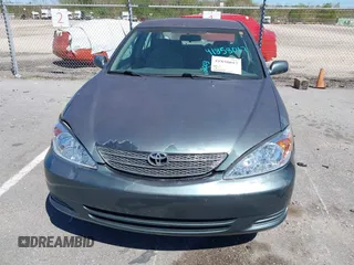 2003 Toyota Camry LE with VIN 4T1BE32K43U665972, listed as a IAAI auction lot 41858017 with 143,137 mi miles and . Bid and sale history available at DreamBid. Image 6.
