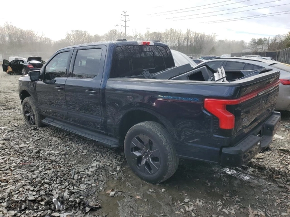 2023 Ford F-150 Lightning Pro z VIN 1FT6W1EV2PWG06829, wystawiony jako Copart lot #45875915 z przebiegiem 30 021 mil mil oraz Szkoda całkowita • Salvage title. Historia ofert i sprzedaży dostępna na DreamBid. Obrazek 2.