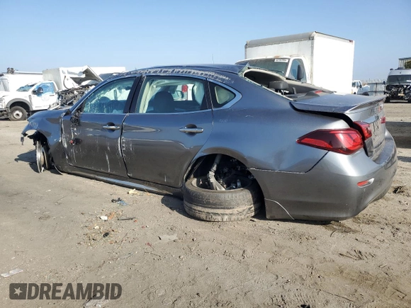 2018 Infiniti Q70 Luxe with VIN JN1BY1PP4JM330456, listed as a Copart auction lot 85368714 with 76,053 mi miles and Salvage title. Bid and sale history available at DreamBid. Image 2.