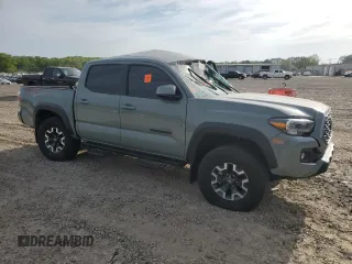 2023 Toyota Tacoma SR z VIN 3TMCZ5ANXPM622882, wystawiony jako Copart lot #53085845 z przebiegiem 11 207 mil mil oraz Szkoda całkowita • Salvage title. Historia ofert i sprzedaży dostępna na DreamBid. Obrazek 4.