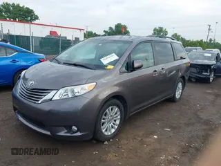2014 Toyota Sienna XLE with VIN 5TDYK3DC0ES496716, listed as a IAAI auction lot 42494549 with 158,645 mi miles and . Bid and sale history available at DreamBid. Image 17.