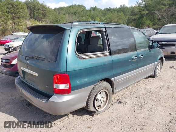 2005 Kia Sedona LX with VIN KNDUP132X56735119, listed as a IAAI auction lot 41798736 with 196,460 mi miles. Bid and sale history available at carsss.com. Image 4.