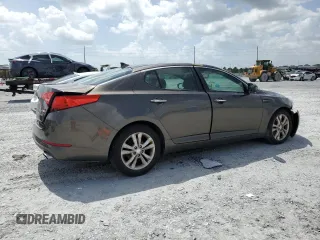 2013 Kia Optima EX z VIN 5XXGN4A72DG188821, wystawiony jako Copart lot #65546495 z przebiegiem 187 286 mil mil oraz Szkoda całkowita • Salvage title. Historia ofert i sprzedaży dostępna na DreamBid. Obrazek 3.