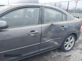 2009 Mazda Mazda3 i Touring Value with VIN JM1BK32G291214834, listed as a IAAI auction lot 40894075 with 128,040 mi miles. Bid and sale history available at carsss.com. Image 6.