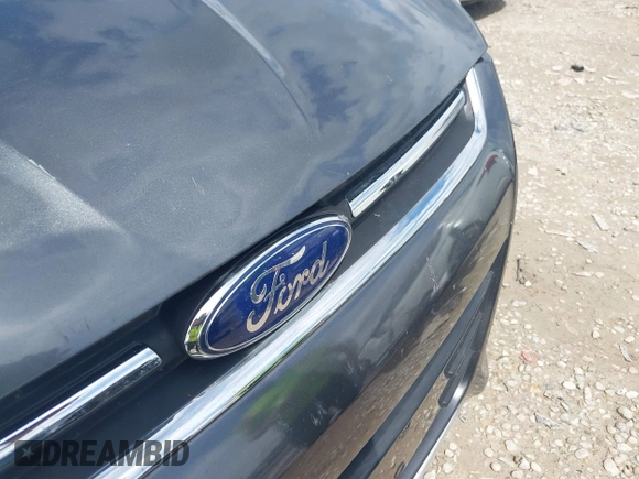 2016 Ford Escape SE with VIN 1FMCU9GXXGUC81604, listed as a IAAI auction lot 42222349 with 106,188 mi miles and . Bid and sale history available at DreamBid. Image 6.