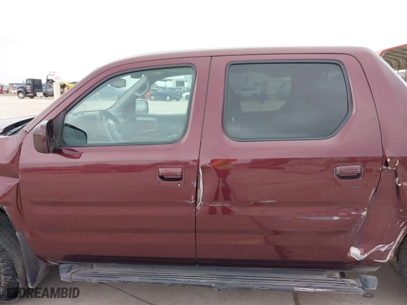 2014 Honda Ridgeline RTL with VIN 5FPYK1F52EB010700, listed as a IAAI auction lot 41490401 with 180,947 mi miles. Bid and sale history available at carsss.com. Image 14.