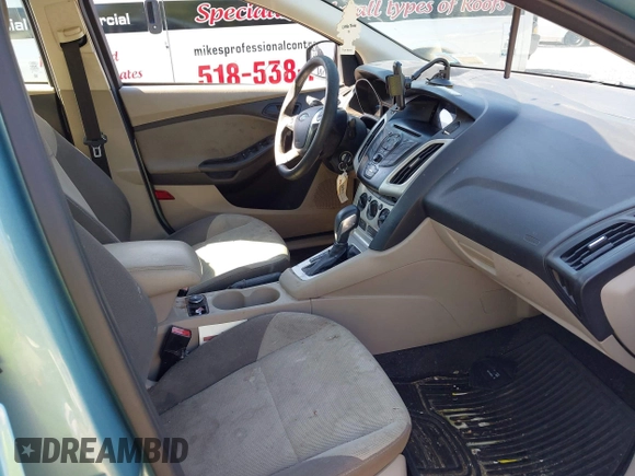 2012 Ford Focus SE with VIN 1FAHP3F25CL307066, listed as a IAAI auction lot 42650943 with 172,643 mi miles and . Bid and sale history available at DreamBid. Image 5.