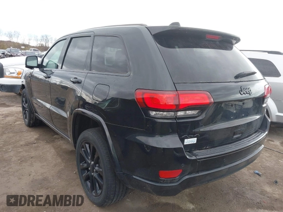 2017 Jeep Grand Cherokee Laredo with VIN 1C4RJFAG7HC886640, listed as a IAAI auction lot 42035301 with 197,110 mi miles. Bid and sale history available at carsss.com. Image 3.