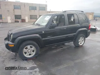 2004 Jeep Liberty Limited with VIN 1J4GL58K94W318379, listed as a IAAI auction lot 41802645 with 275,834 mi miles. Bid and sale history available at carsss.com. Image 20.