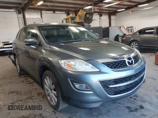 2011 Mazda CX-9 Grand Touring z VIN JM3TB2DA6B0305227, wystawiony jako IAAI lot #42235571 z przebiegiem 138 744 mil mil oraz . Historia ofert i sprzedaży dostępna na DreamBid. Obrazek 1.