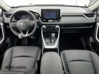 2022 Toyota RAV4 Hybrid XLE Premium with VIN 2T3B6RFV5NW034498, listed as a Copart auction lot 62395105 with 10,590 mi miles and Clean title. Bid and sale history available at DreamBid. Image 8.