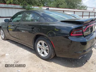 2023 Dodge Charger SXT z VIN 2C3CDXBG0PH564343, wystawiony jako IAAI lot #42351311 z przebiegiem 52 570 mil mil oraz . Historia ofert i sprzedaży dostępna na DreamBid. Obrazek 3.