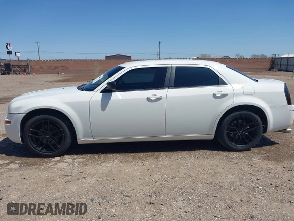 2009 Chrysler 300 Touring with VIN 2C3KA53V89H634048, listed as a IAAI auction lot 41974629 with Not Provided miles and . Bid and sale history available at DreamBid. Image 14.