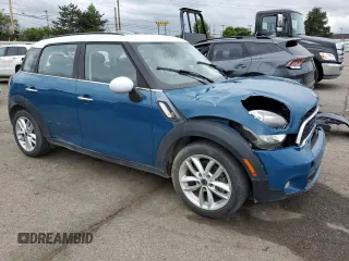 2012 MINI Countryman S with VIN WMWZC3C57CWL86423, listed as a Copart auction lot 57584195 with 102,184 mi miles and Salvage title. Bid and sale history available at DreamBid. Image 4.