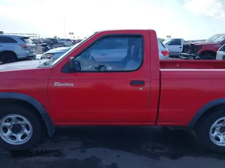 2000 Nissan Frontier XE z VIN 1N6DD21SXYC366427, wystawiony jako IAAI lot #42111404 z przebiegiem 176 579 mil mil oraz . Historia ofert i sprzedaży dostępna na DreamBid. Obrazek 15.
