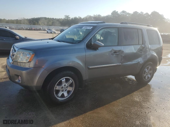 2009 Honda Pilot Touring with VIN 5FNYF388X9B012023, listed as a Copart auction lot 74843174 with 221,210 mi miles and Salvage Title. Bid and sale history available at carsss.com. Image 1.