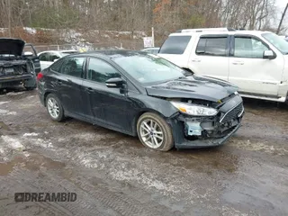 2016 Ford Focus SE with VIN 1FADP3FE7GL236032, listed as a IAAI auction lot 41597830 with 116,312 mi miles. Bid and sale history available at carsss.com. Image 1.