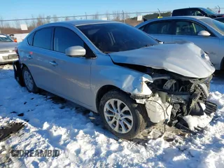 2018 Nissan Sentra SV z VIN 3N1AB7AP6JL655421, wystawiony jako IAAI lot #41407576 z przebiegiem 98 854 mil mil oraz . Historia ofert i sprzedaży dostępna na DreamBid. Obrazek 1.