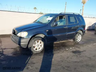 2001 Mercedes-Benz M-Class with VIN 4JGAB72E01A251463, listed as a IAAI auction lot 41392480 with 1 mi miles. Bid and sale history available at carsss.com. Image 2.