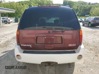 2003 GMC Envoy SLT z VIN 1GKET16S136186780, wystawiony jako Copart lot #55927155 z przebiegiem 163 099 mil mil oraz Szkoda całkowita • Salvage title. Historia ofert i sprzedaży dostępna na DreamBid. Obrazek 6.