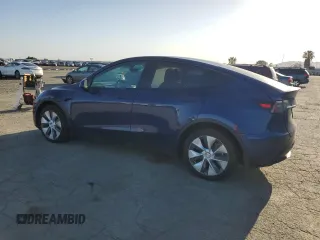 2022 Tesla Model Y Long Range z VIN 7SAYGDEE4NF408202, wystawiony jako Copart lot #51790905 z przebiegiem 43 509 mil mil oraz Szkody całkowita. Historia ofert i sprzedaży dostępna na DreamBid. Obrazek 2.