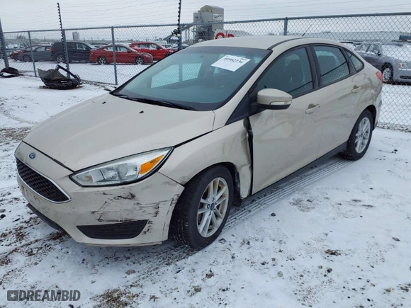 2017 Ford Focus SE with VIN 1FADP3F2XHL276970, listed as a IAAI auction lot 40982236 with 100,155 mi miles. Bid and sale history available at carsss.com. Image 2.