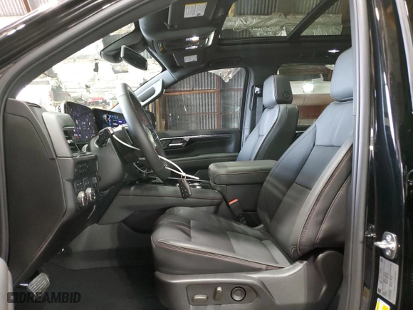2025 Chevrolet Suburban RST with VIN 1GNS6ERL1SR112782, listed as a Copart auction lot 50931715 with 1,366 mi miles and Salvage Title. Bid and sale history available at carsss.com. Image 7.