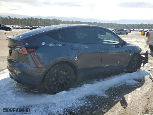 2021 Tesla Model Y Standard Range with VIN 5YJYGDED5MF112740, listed as a Copart auction lot 89188825 with 99,991 mi miles and Salvage Title. Bid and sale history available at carsss.com. Image 3.
