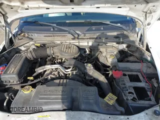 2003 Dodge Dakota Sport with VIN 1D7HL38X03S275203, listed as a IAAI auction lot 41992763 with 153,176 mi miles. Bid and sale history available at carsss.com. Image 10.