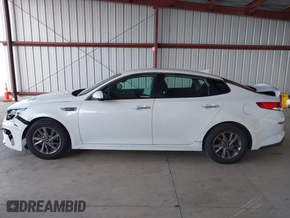 2020 Kia Optima SE z VIN 5XXGT4L36LG393377, wystawiony jako IAAI lot #41836704 z przebiegiem 86 234 mil mil oraz . Historia ofert i sprzedaży dostępna na DreamBid. Obrazek 14.