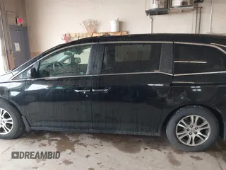 2012 Honda Odyssey EX z VIN 5FNRL5H4XCB017557, wystawiony jako IAAI lot #42367322 z przebiegiem 209 630 mil mil oraz . Historia ofert i sprzedaży dostępna na DreamBid. Obrazek 14.