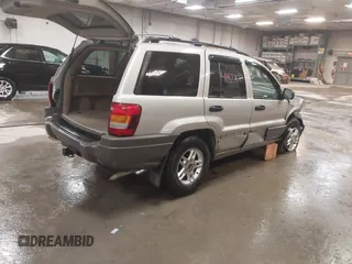 2004 Jeep Grand Cherokee Laredo with VIN 1J4GW48S44C321869, listed as a IAAI auction lot 41822099 with 181,663 mi miles. Bid and sale history available at carsss.com. Image 4.