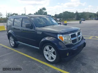 2011 Dodge Nitro Heat with VIN 1D4PT4GK9BW554273, listed as a IAAI auction lot 42077940 with 75,533 mi miles. Bid and sale history available at carsss.com. Image 1.