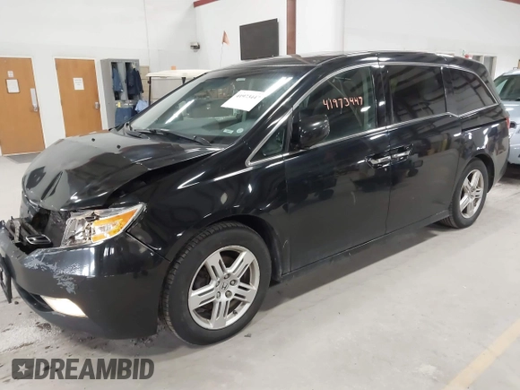 2011 Honda Odyssey Touring with VIN 5FNRL5H9XBB055008, listed as a IAAI auction lot 41973447 with 218,762 mi miles and . Bid and sale history available at DreamBid. Image 17.