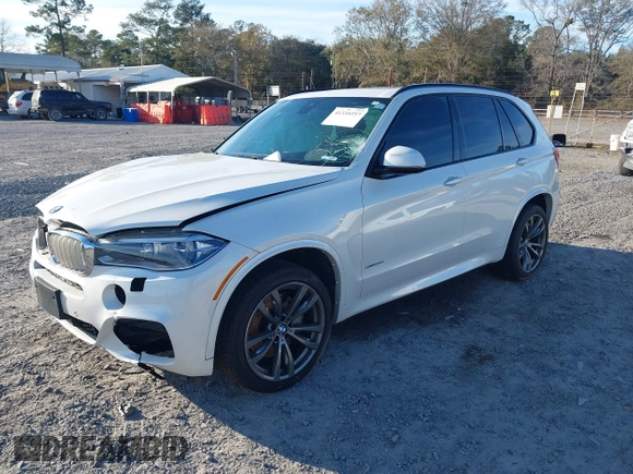 2015 BMW X5 xDrive50i z VIN 5UXKR6C58F0J78013, wystawiony jako IAAI lot #41335257 z przebiegiem Nie podano mil oraz . Historia ofert i sprzedaży dostępna na DreamBid. Obrazek 16.