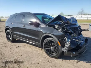 2020 Cadillac XT4 FWD Sport with VIN 1GYFZER42LF060280, listed as a Copart auction lot 48710445 with 69,964 mi miles and Salvage title. Bid and sale history available at DreamBid. Image 4.