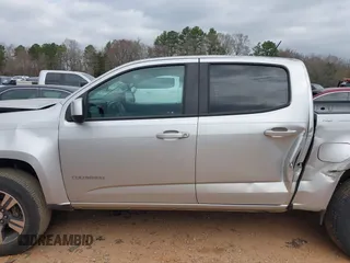 2018 Chevrolet Colorado 2WD Work Truck with VIN 1GCGSBEN5J1306373, listed as a IAAI auction lot 41843621 with 94,766 mi miles and . Bid and sale history available at DreamBid. Image 14.