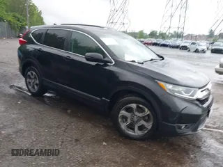 2018 Honda CR-V EX-L z VIN 7FARW2H81JE079634, wystawiony jako IAAI lot #42255734 z przebiegiem 118 409 mil mil oraz . Historia ofert i sprzedaży dostępna na DreamBid. Obrazek 1.
