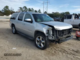 2014 Chevrolet Suburban LTZ with VIN 1GNSCKE02ER141764, listed as a Copart auction lot 85005524 with 234,019 mi miles and Salvage title. Bid and sale history available at DreamBid. Image 4.