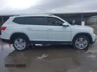 2019 Volkswagen Atlas SE z VIN 1V2WR2CA9KC593891, wystawiony jako IAAI lot #41947078 z przebiegiem 74 525 mil mil oraz . Historia ofert i sprzedaży dostępna na DreamBid. Obrazek 14.