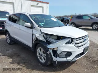 2017 Ford Escape SE with VIN 1FMCU9GD2HUE56001, listed as a IAAI auction lot 41818422 with 57,597 mi miles. Bid and sale history available at carsss.com. Image 1.