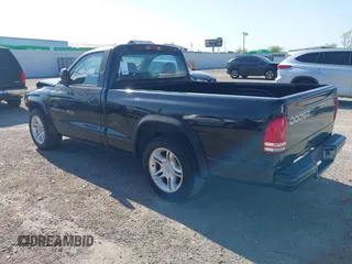 2000 Dodge Dakota SLT with VIN 1B7GL26ZXYS720333, listed as a IAAI auction lot 41972966 with 111,584 mi miles and . Bid and sale history available at carsss.com. Image 3.
