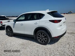 2018 Mazda CX-5 Touring with VIN JM3KFACM6J1301189, listed as a Copart auction lot 58255024 with 85,052 mi miles and Clean Title. Bid and sale history available at carsss.com. Image 2.
